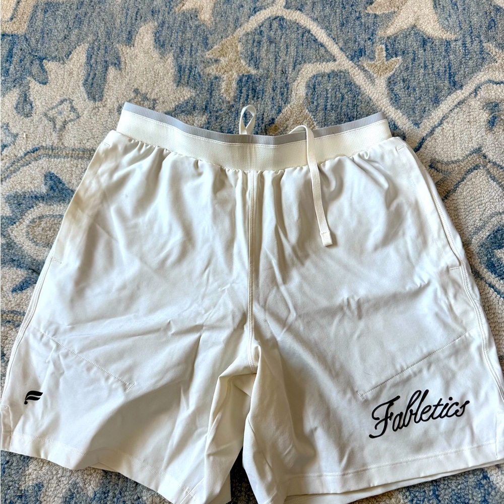 Fabletics performance shorts. Men’s size small. Have liner and two pockets.